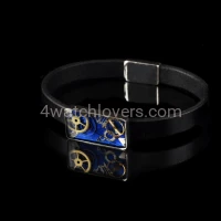 Silver bracelet with a composition of watch parts on a blue background art watches handmade original elegant unique exclusive jewelry 3.JPG