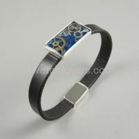 Silver bracelet with a composition of watch parts on a blue background art watches handmade original elegant unique exclusive jewelry 6.JPG