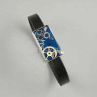 Silver bracelet with a composition of watch parts on a blue background art watches handmade original elegant unique exclusive jewelry 5.JPG